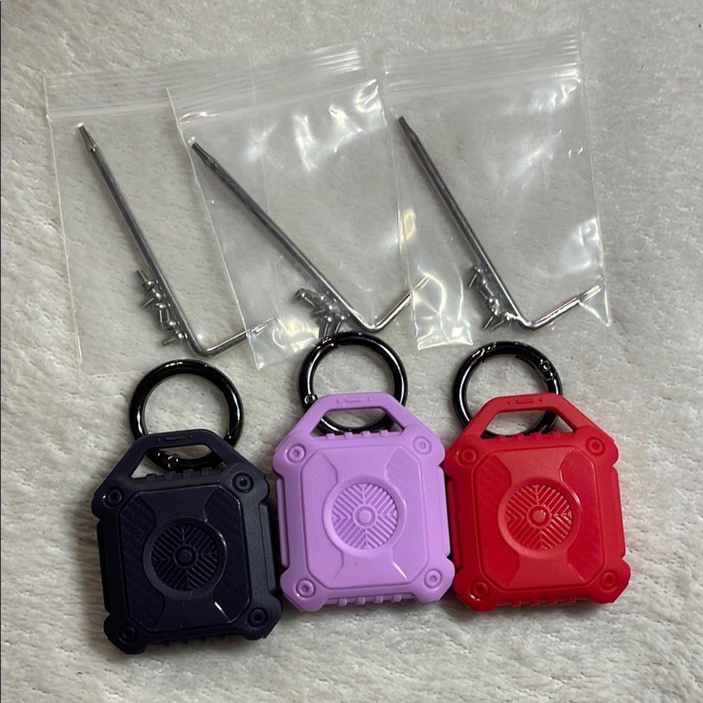 Set of Three waterproof, AirTag Cases - Black, Purple, Red